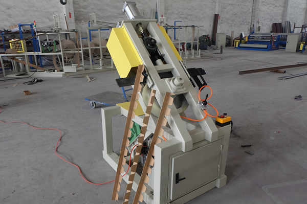 Coil edge protector machine